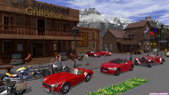 木造の建物の並ぶ通りと赤いオープンカー